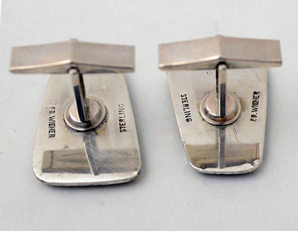 Abstract design (or might they be E's ?) silver cufflinks by New York modernist jeweler, Ed Wiener. The black areas are oxidized silver. Measurements are 3/4