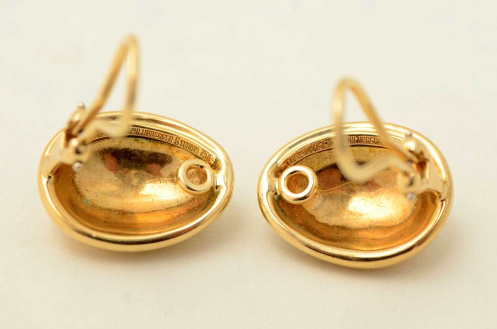 Gold earrings by Schlumberger Studios for Tiffany. These oval ear clips have a nice combination of textures. Measurements are 7/8" tall x 5/8" wide. Clip backs can be converted to posts.