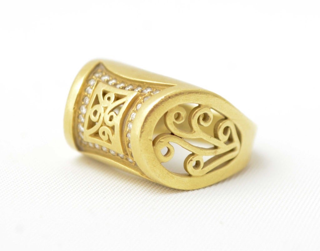 Unusual ring by Barry Kieselstein Cord that is both heavy and delicate. The openwork on all sides makes this truly a miniature sculpture. It is size 6 1/2 but can be sized up or down. Hallmarked on both the inside and out. What may look like a nick