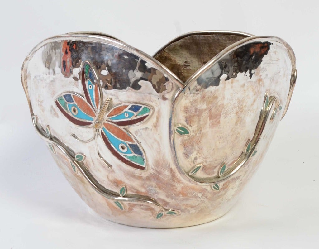 Large bowl by Emilia Castillo with butterflies; vines with leaves. They are made colorful with inset stones of coral; malachite; lapis lazuli and turquoise. Originally retailed by Neiman Marcus. It measures 9