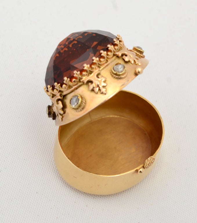 Wonderfully detailed gold pillbox with a huge  dark citrine top and diamonds surrounding the gold. Tests 18 karat. From the estate of the late actress, Merle Oberon (1911 - 1979).