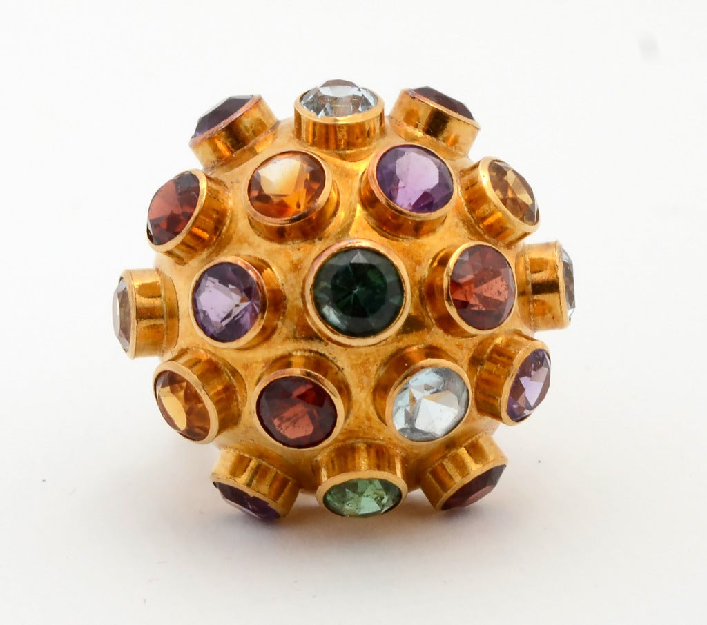 Large size Sputnik ring with a variety of semi precious stones that include: citrine; amethyst; garnet and peridot. Graceful tendrils below the dome make this example more detailed than most. Diameter of the top of the dome is 3/4