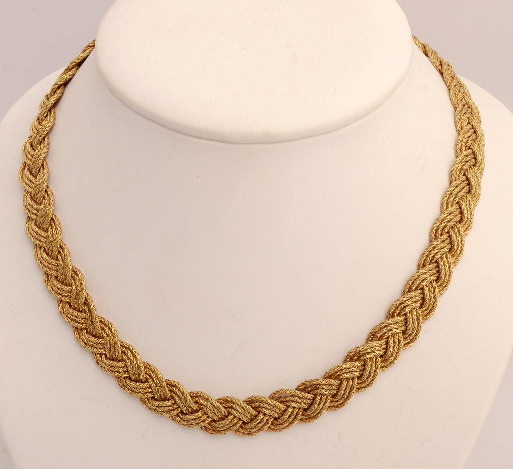 Textured gold is beautifully interwoven  in this choker necklace by Tiffany known as the Braided Ropes design. Measures 16 1/2