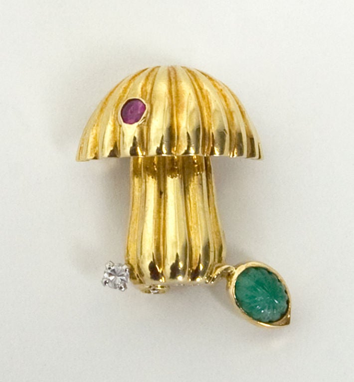 Whimsical Toadstool or Mushroom Brooch made of 18 karat gold with a ruby, diamond and emerald. Measures 1
