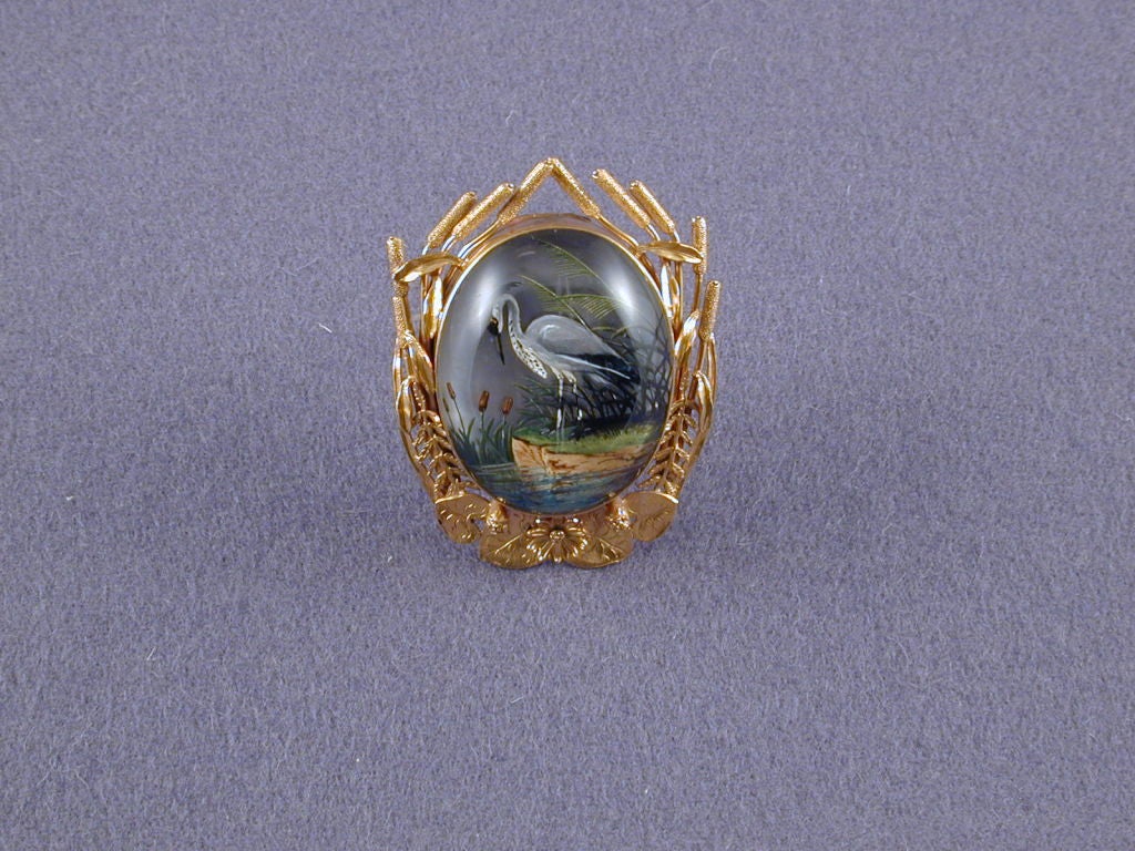 An Unusual Reverse Intaglio Crystal Egret Enameled Brooch