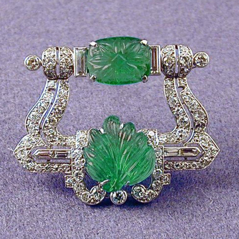 CARTIER LONDON  Rare Pair Carved Emeralds and Diamonds Brooch mounted in Platinum.