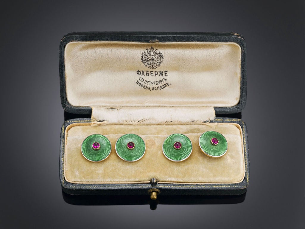 This remarkably rare pair of Fabergé jeweled and enameled cufflinks displays the outstanding artistry for which this legendary firm is known. Crafted by Fabergé goldsmith master August Frederik Hollming of the St. Petersburg workshop (1898-1908),