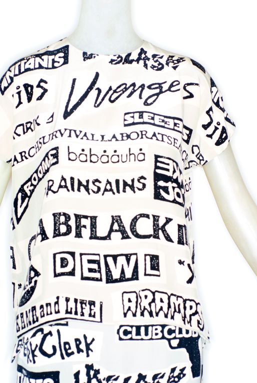 Stephen Sprouse Sticker Print Ensemble.  Silk sticker print t shirt style top, wool skirt and wool sticker print oversize coat.