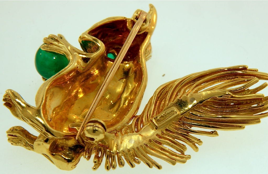 18K Yellow Gold with Emerald Eye and Acorn Nut, and Diamond Studded Tail. With signature.