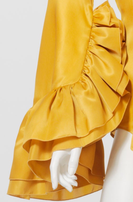 Givenchy Couture 18th Century-inspired blouse in satin-finish ochre with over-sized ruffle neckline and cuffs.<br />
<br />
Snap-up front closure. Couture #7HP 7360643720.