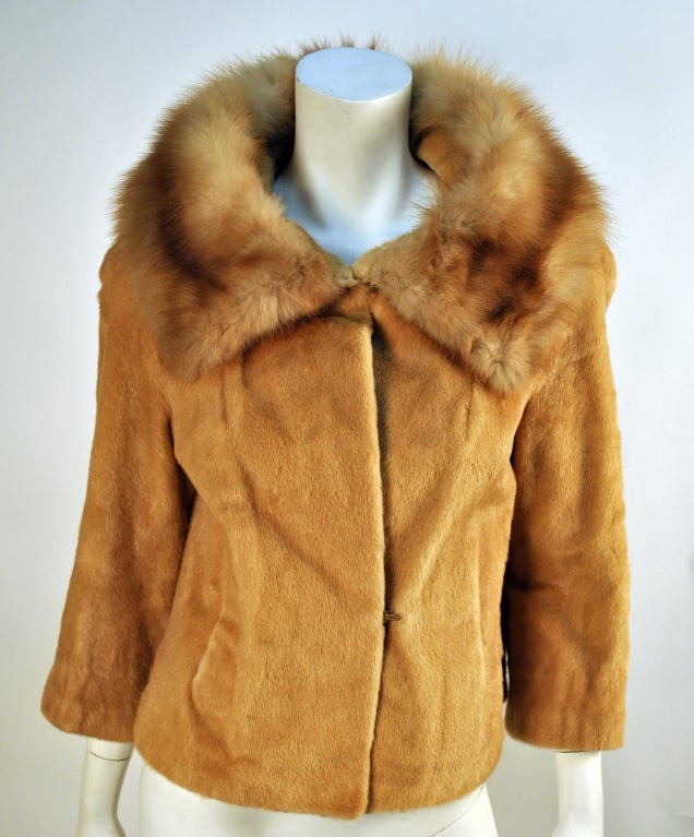 Interesting period Elsa Schiaparelli fur, retailed from Eatons Canada. Great design and looks amazing on. I know it's summer, but I couldn't resist the excitement. All closures are present, and the fur collar looks and feels good. I am not sure what