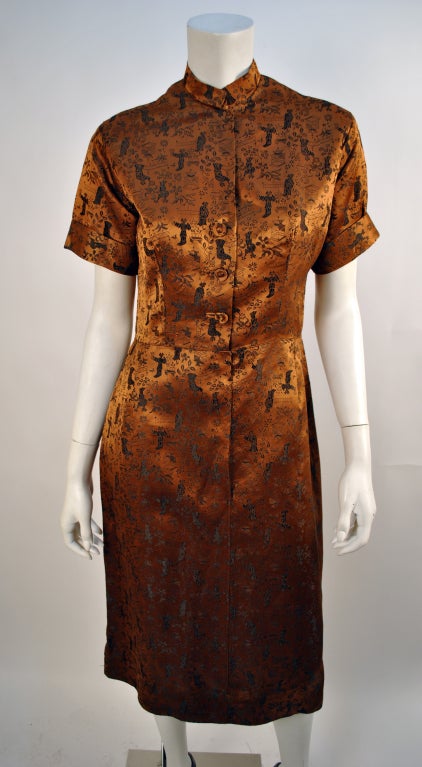 Really interestingly designed Ceil Chapman dress. This dress features covered buttons, oriental collar and a very beautiful fit. Ceil is often said to be Marilyn Monroe’s favourite designer, and I can see why here. Please ask any and all questions.