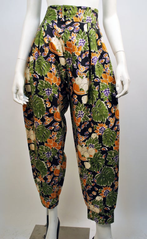 Yves Saint Laurent, likely early 1980's printed floral silk trousers. These trousers are super cute, and feature a very bold floral print, and high waist design. Only pair I have ever seen!