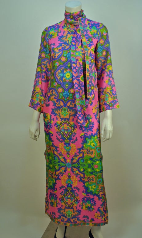 Vintage Lanvin psychedelic paisley multicolour caftan dress is has the most beautiful colour pallet! with gorgeous pinks, purples, blues and greens this electric dress is definitely an eye catching piece to own!