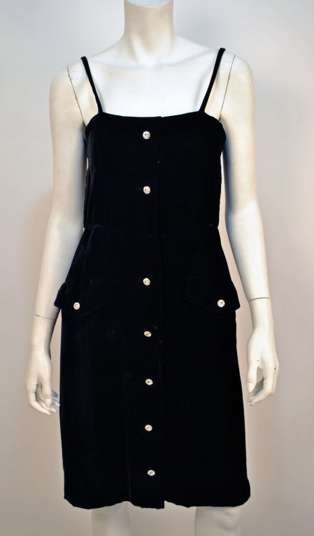 Vintage Valentino diamond black velvet cocktail dress has dainty pockets at the waist of the dress, the perfect place to put a lipstick for quick touch ups! This stunning piece is cut beautifully to compliment your figure, no doubt heads will turn!