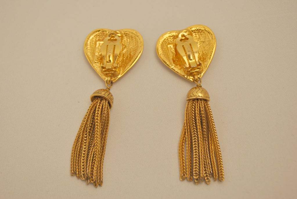 Very sweet YSL gold tone heart shaped tassel earrings. Clip on earrings Made in France, vintage 1980's. Very romantic.