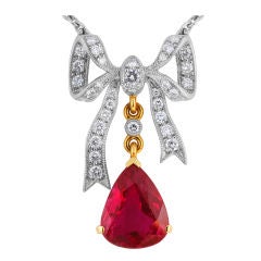 Delightful Ruby Diamond Platinum Bow Pendant