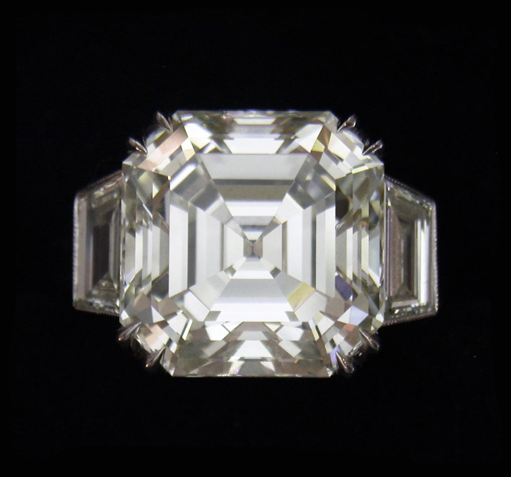 Part of the Shreve, Crump and Low important stones collection, Shreve, Crump and Low presents this beautiful 11.42 carat Ascher cut diamond. The near colorless and clean center stone is accented by two step cut trapeziod diamonds having a combined