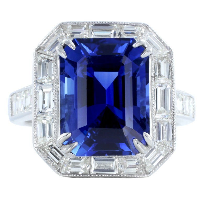 Vivid 6.81ct Emerald Cut Sapphire and Diamond Ring at 1stDibs
