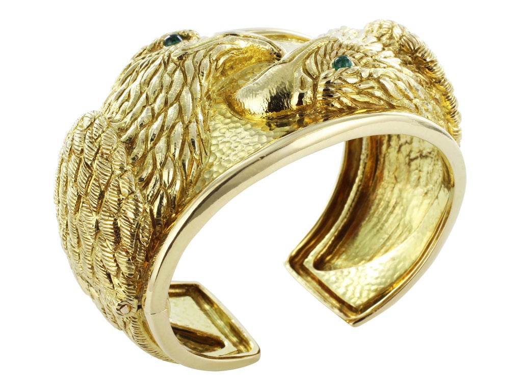 Estate 18 karat yellow gold and emerald eagle motif cuff bracelet signed Webb for David Webb.