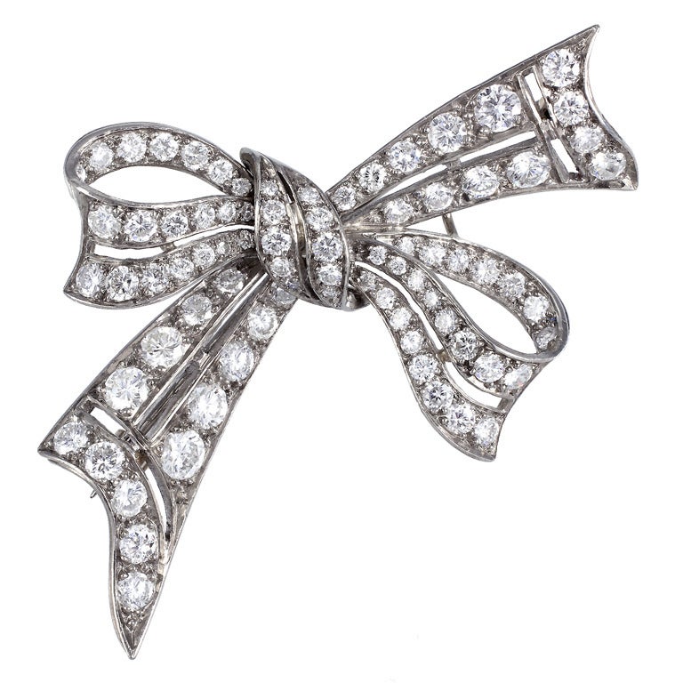 Charming 4.20ctw Diamond Bow Pin For Sale