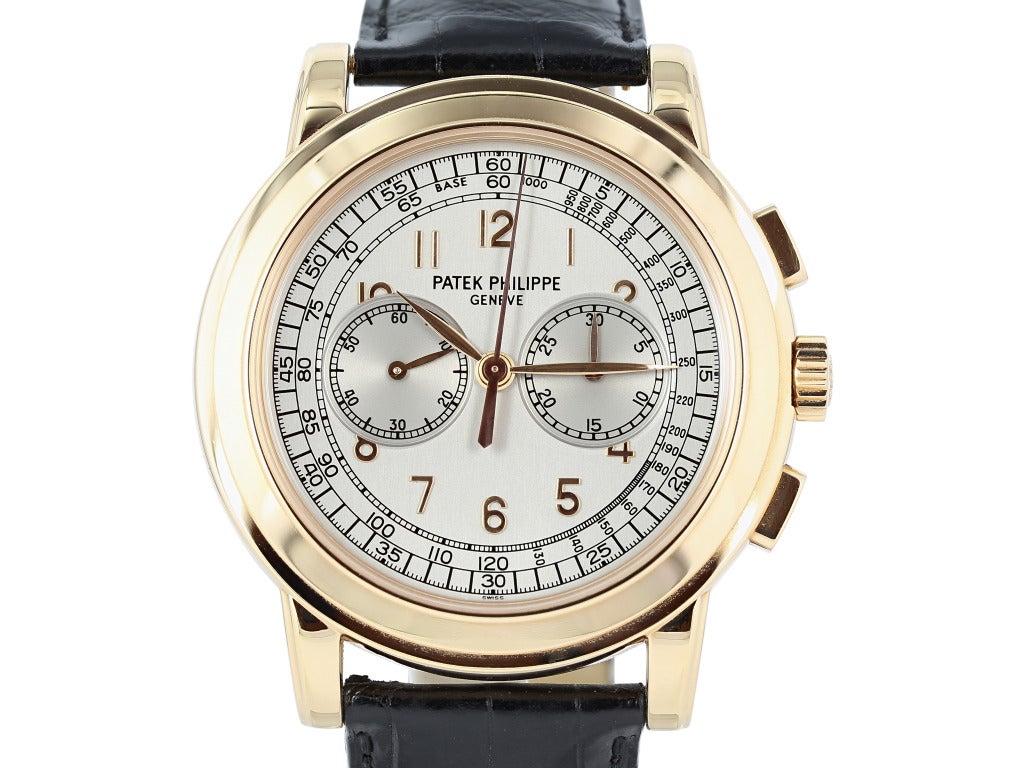 Patek Philippe 18k rose gold oversized chronograph wristwatch, Ref. 5070R, 42mm, manual-wind movement, silvered dial, sapphire crystal, leather strap with deployant buckle. 

Watch is like new and comes with Patek Philippe Archive paper, no box.