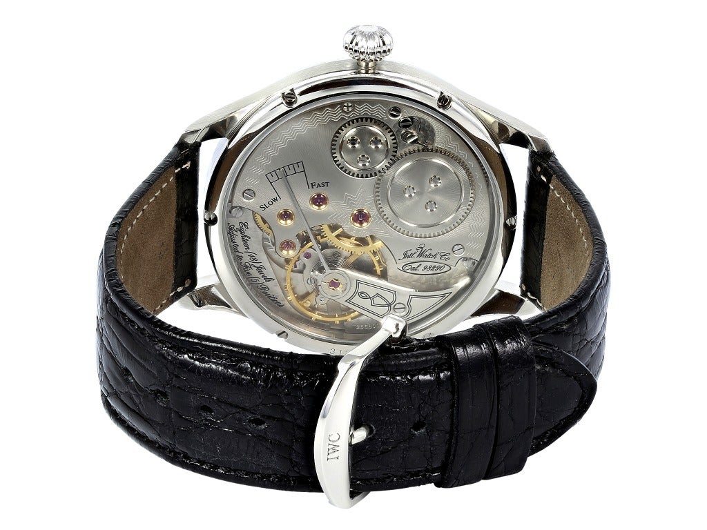 IWC platinum Portuguese FA Jones limited edition wristwatch, number 466/500, 43mm, Ref. IW544202, with white dial, manual-wind movement with 46-hour power reserve, sub seconds, sapphire crystal and sapphire crystal exhibition back, black leather