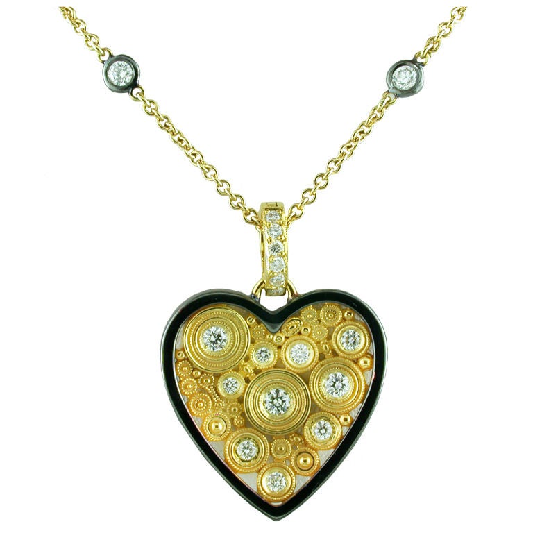 Diamond Two Color Gold Heart Necklace For Sale