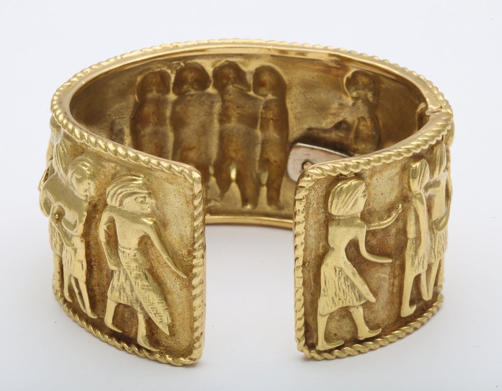 Large Gold Ancient Egypt Motif Bangle For Sale at 1stDibs