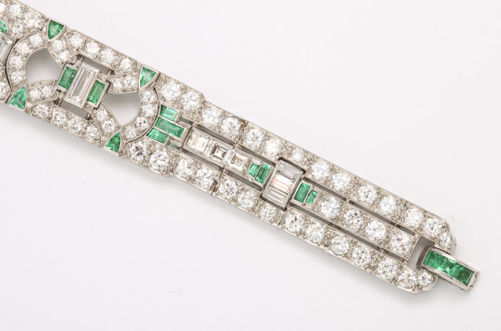 J.E. Caldwell platinum bracelet is set with beautiful emeralds and diamonds.

Estimated emerald weight: 2.35ct
Estimated round diamond weight: 2.83ct
Estimated round diamond weight: 1.27ct
Estimated square diamond weight: 0.48ct
Estimated