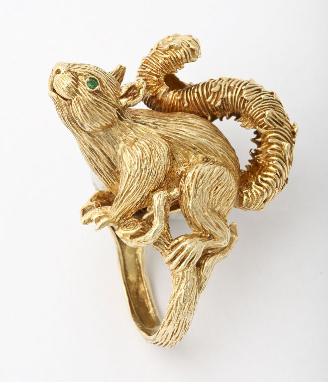Squirrel ring by California jewelry artist Kurt Wayne, crafted of 18KT gold, set with emerald eyes. Dated 1969. Size 7 1/2