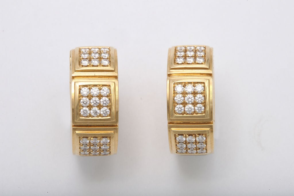 Mauboussin 18K gold hoop earrings, one side set with pearls, and one side set with  diamonds. Gold and Mauboisson marks. Perfect for travel, or day and night options.
