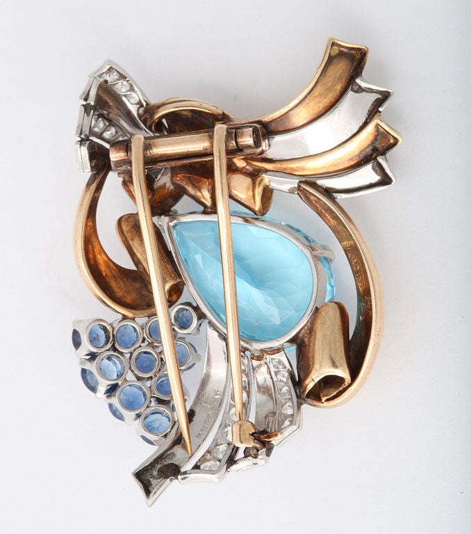 RAYMOND YARD Gold Brooch of Aqua, Sapphires and  Diamonds