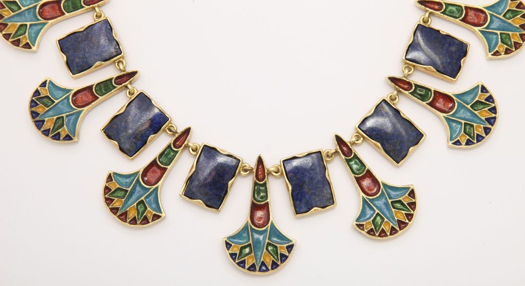 Egyptian Revival RUVEN PERELMAN Enameled Gold and Lapis Necklace
From world renowned jewelry artist Ruven Perelman, a one-of-a-kind Egyptian style necklace of enameled 18K gold with lapis links. A substantial 160 grams of gold, and luxurious 17