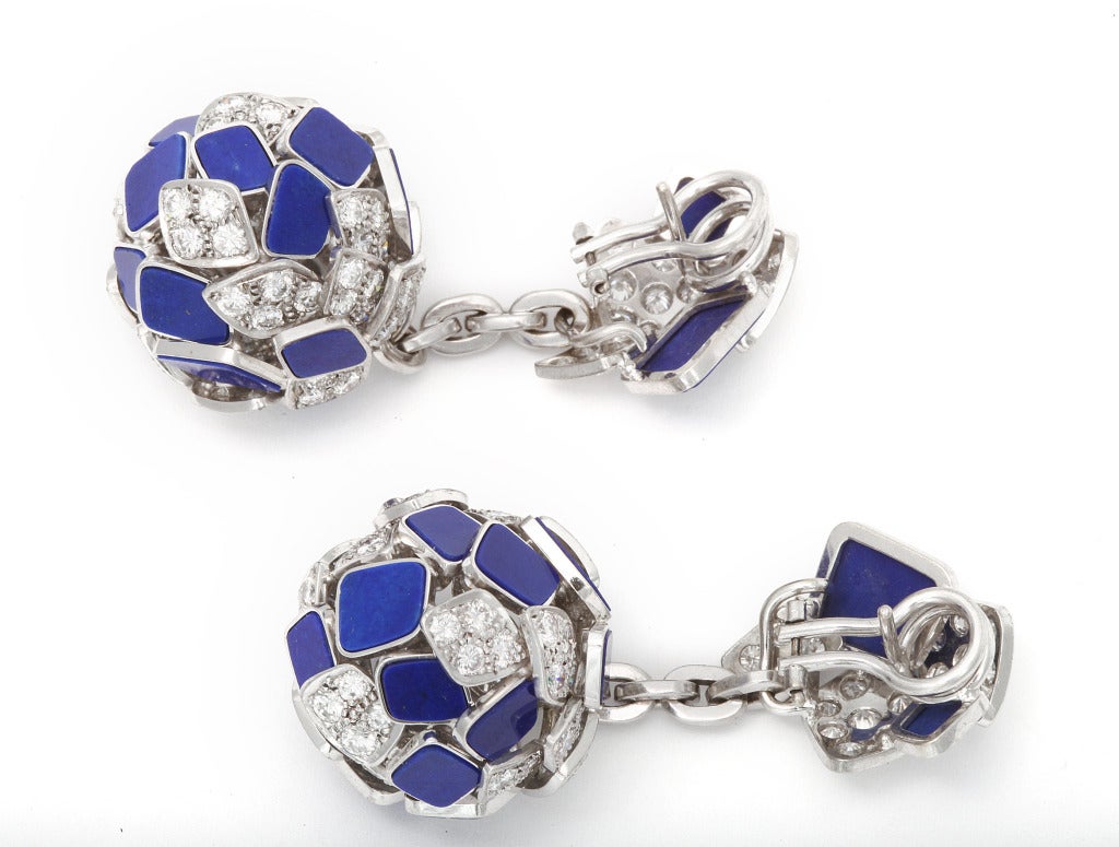 1970s Ultra-chic dinner, club playful, or even on your wedding day (as pictured), Modernist ball drop earrings of 14K white gold, consisting of overlapping sections of pave diamonds and carved rich blue lapis, with night/day option of detachable