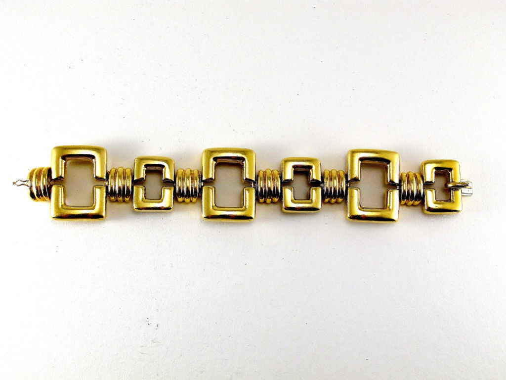 Bold 18KT gold Tiffany bracelet of thick open rectangular links and curved channeled connecting links. 1 1/4 x 7 1.14 inches. Tiffany mark.