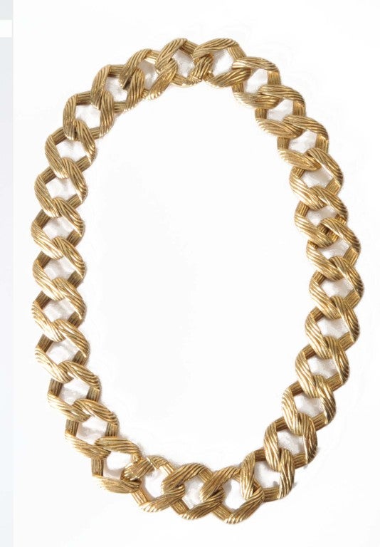 Ruser 14K yellow gold link necklace
The necklace breaks down into two bracelets. 
Circa 1950’s