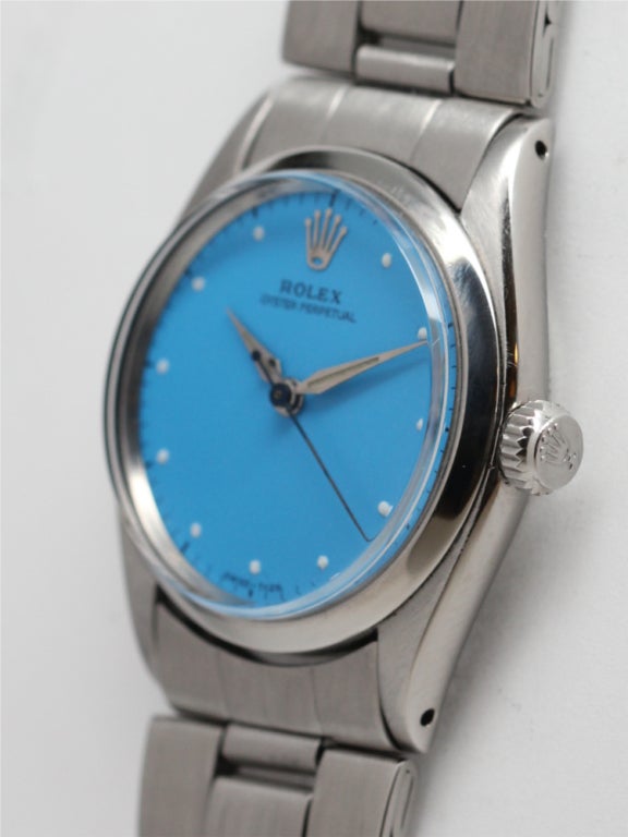 Rolex stainless steel midsize Oyster Perpetual, circa 1956. 31mm diameter case with smooth bezel and custom colored 