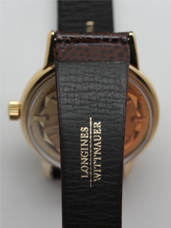 Orologio da polso automatico Conquest di Longines in oro giallo, circa anni '60 1