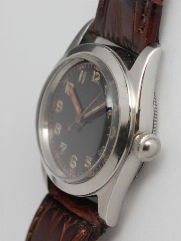 Rolex stainless steel Speedking, circa 1944, 31mm diameter Oyster case with screw-down crown and original glossy black dial with luminous indexes and matching luminous pencil hands. Signed gilt Swiss Made and Rolex Oyster Speedking (print faded, but