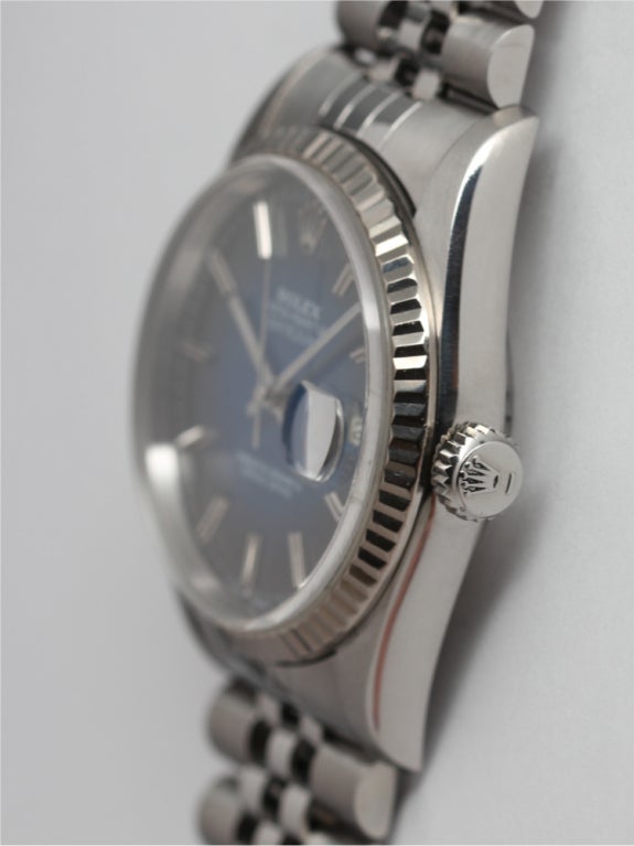 Rolex stainless steel Datejust, Ref 16234, 36mm case with 18k white gold fluted bezel, serial W8, circa 1996. Sapphire crystal, beautiful original gradient blue dial with lighter center and darker surrounds. Quick-set cal. 3135 movement with sweep