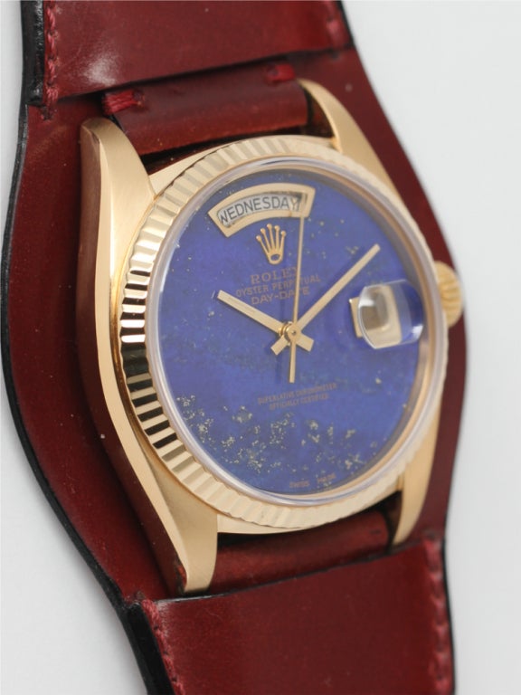 Rolex 18k yellow gold Day-Date wristwatch, Ref 18038, serial 5.3 million, circa 1977, with beautiful and factory original intense blue lapis dial with gold specks. 36mm diameter case with your choice of fluted or smooth bezel, sapphire crystal, and