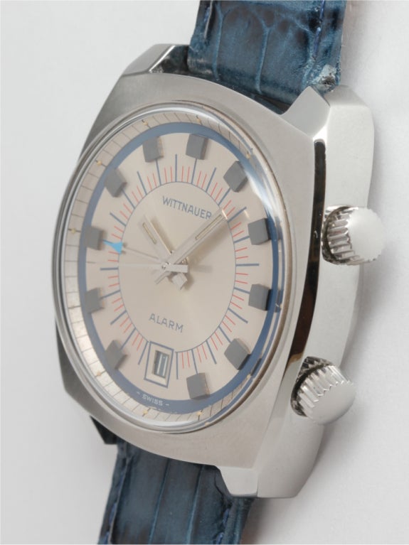 Wittnauer stainless steel Alarm wristwatch, 35 X 40mm cushion screw-back case with heavy angled lugs. Beautiful condition original silvered satin dial with blue and red printed minute track outer blue ring, applied faceted indexes, luminous minute