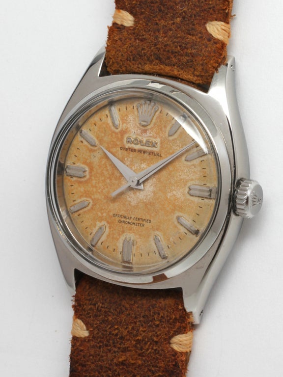 Rolex stainless steel Oyster Perpetual scarce early Ref. 6500, serial 919,XXX, circa 1953. 34mm diameter case with smooth bezel and original patinaed dial with raised tapered indexes and tapered daupine hands. Self-winding calibre 1030 movement with