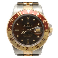 ROLEX Stainless Steel and Yellow Gold GMT-Master Wristwatch Ref. 16753 circa 1985