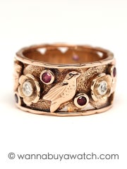 Rose gold wide band with rubies and diamonds