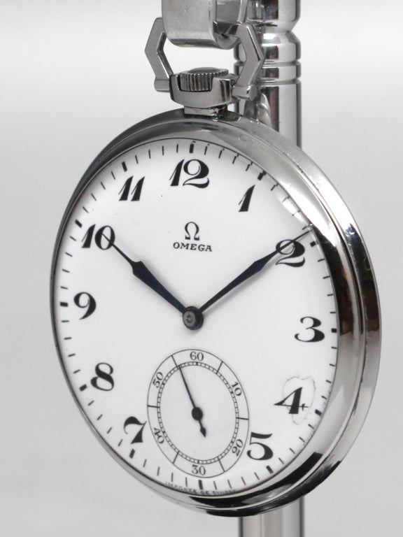 Omega 16-size open face pocket watch, circa 1940s. Clean base metal industrial design case, very pleasing white enamel dial with black arabic figures. 17-jewel manual-wind movement with subsidiary seconds and large blued steel spade style hands.