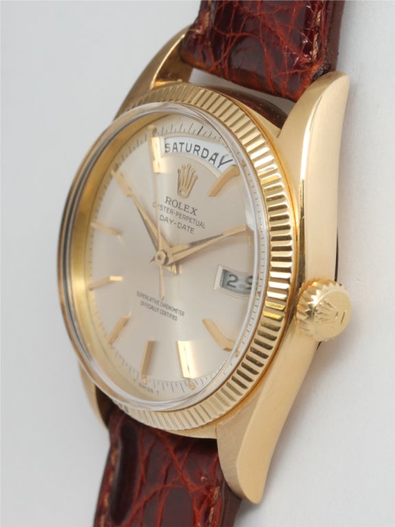 Rolex 18k yellow gold Day-Date wristwatch, Ref. 1803, serial 580,XXX, circa 1960. Full-size 36mm diameter case in superb condition with finely milled bezel, beautiful condition original silvered satin pie-pan dial with gold applied indexes and gold