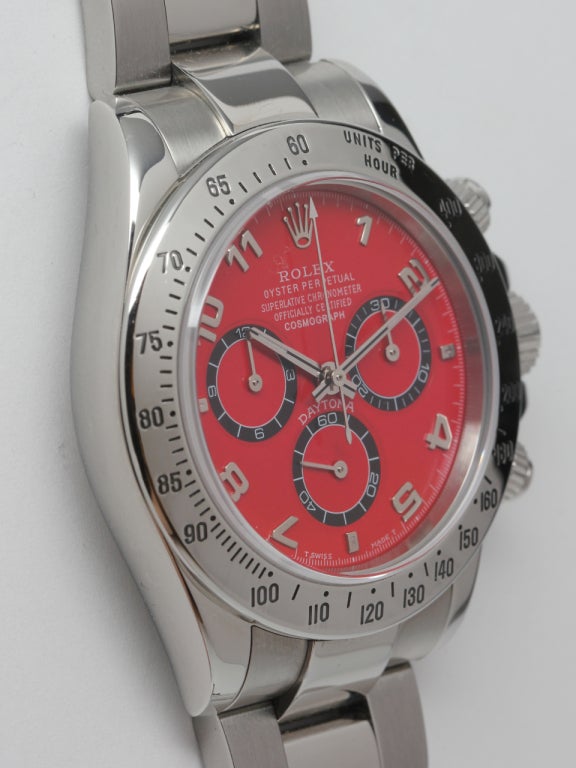 Rolex stainless steel Daytona wristwatch, ref#116520, K9 serial number, circa 2002. Current production model with Rolex in-house movement. Solid end link bracelet and new style short flip lock deployment clasp. With custom colored red sport Daytona