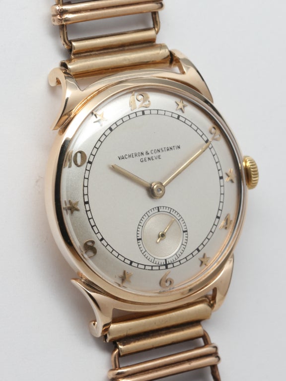 Vacheron & Constantin star dial curly lug wristwatch. Medium size 28.5 x 35mm 14k yellow gold case with nicely restored two-tone satin-finished dial with applied gold stars and hour indexes. 17-jewel manual-wind calibre 458 movement with subsidiary